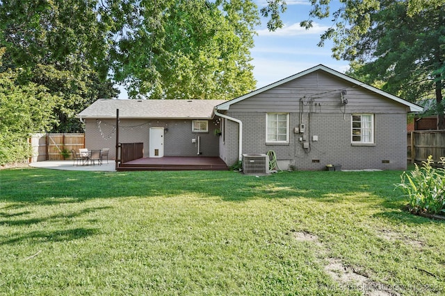 3926 E 51st Pl, Tulsa, OK 74135 - back of property featuring brick siding, a wooden deck, a patio area, and crawl space