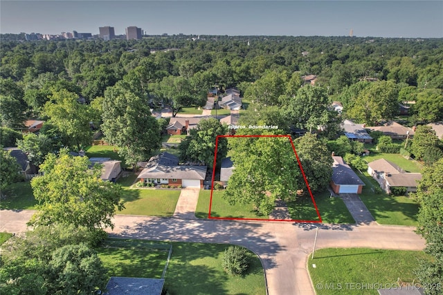 3926 E 51st Pl, Tulsa, OK 74135 - aerial perspective of suburban area featuring a forest and property parcel outlined