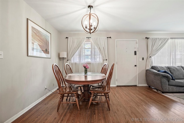 3926 E 51st Pl, Tulsa, OK 74135 - dining room with a chandelier and wood finished floors