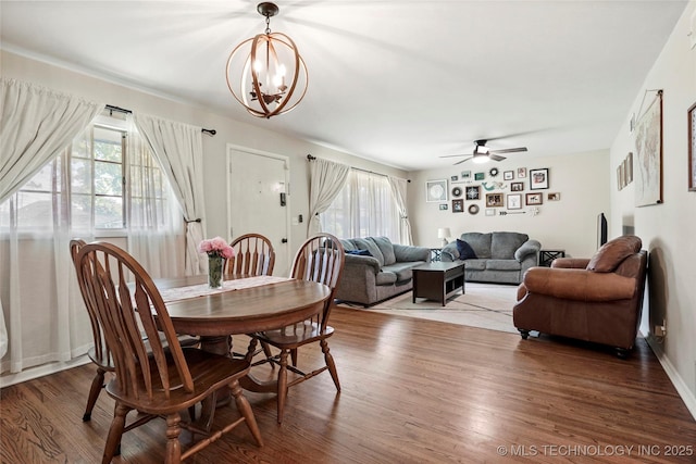 3926 E 51st Pl, Tulsa, OK 74135 - dining area featuring a chandelier, wood finished floors, and ceiling fan