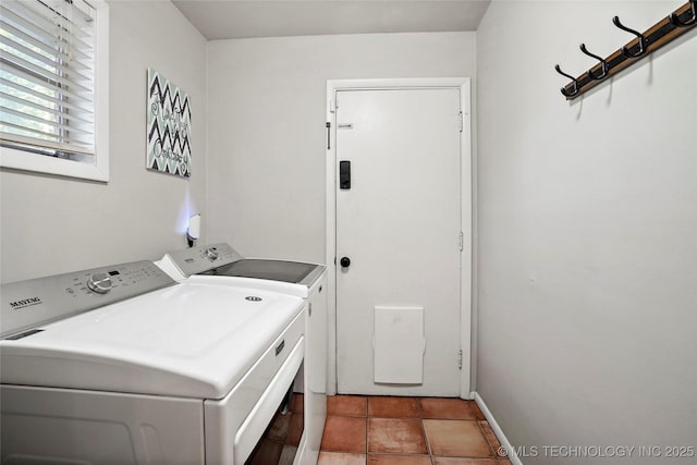 3926 E 51st Pl, Tulsa, OK 74135 - washroom featuring washing machine and clothes dryer and light tile patterned floors
