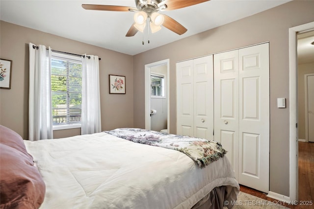 3926 E 51st Pl, Tulsa, OK 74135 - bedroom with wood finished floors, a closet, and a ceiling fan