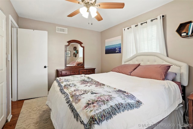 3926 E 51st Pl, Tulsa, OK 74135 - bedroom featuring wood finished floors and ceiling fan