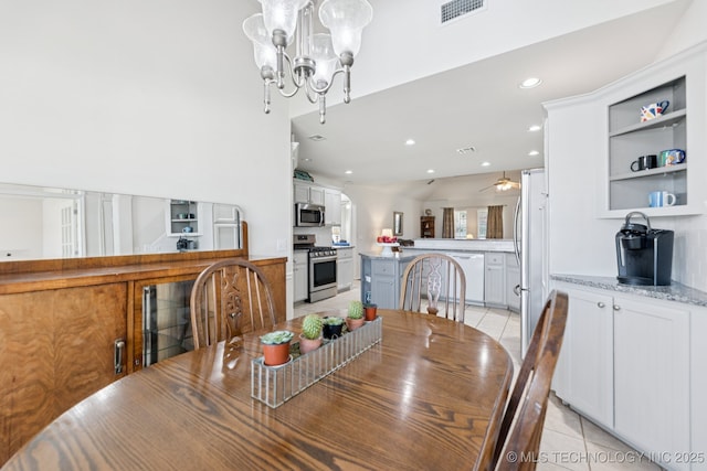 1014 W 120th St S, Jenks, OK 74037 - dining room with light tile patterned floors, a chandelier, a ceiling fan, and recessed lighting