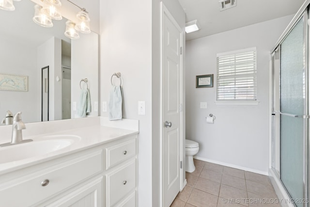 1014 W 120th St S, Jenks, OK 74037 - bathroom featuring vanity, tile patterned floors, and a shower with door