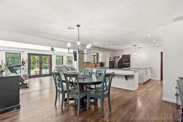 18251 145th W Ave, Sapulpa, OK 74066 - dining room with a textured ceiling, wood finished floors, recessed lighting, and ceiling fan