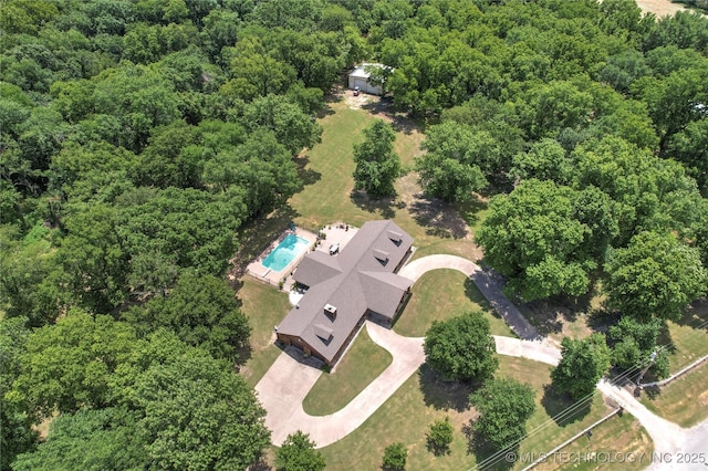 18251 145th W Ave, Sapulpa, OK 74066 - view of property location with a pool area and a heavily wooded area
