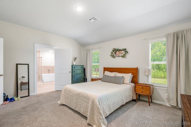 7245 E 154th St S, Bixby, OK 74008 - bedroom featuring carpet, lofted ceiling, and ensuite bathroom