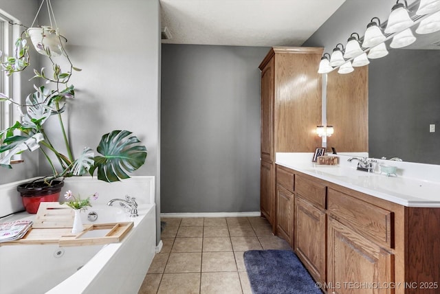 545 E 498th Cir, Pryor, OK 74361 - bathroom with vanity, a tub with jets, and tile patterned floors