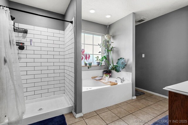 545 E 498th Cir, Pryor, OK 74361 - full bath with a shower stall, a bath, tile patterned flooring, and vanity