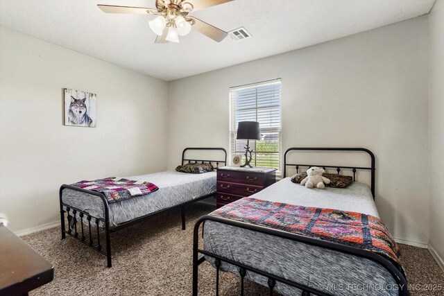 545 E 498th Cir, Pryor, OK 74361 - carpeted bedroom with baseboards and a ceiling fan
