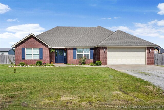 545 E 498th Cir, Pryor, OK 74361 - view of front of property featuring driveway, an attached garage, a shingled roof, and brick siding