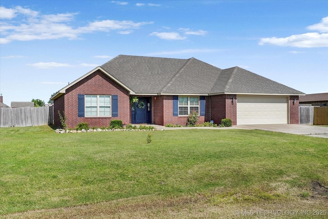 545 E 498th Cir, Pryor, OK 74361 - view of front of home with an attached garage, brick siding, concrete driveway, and a shingled roof