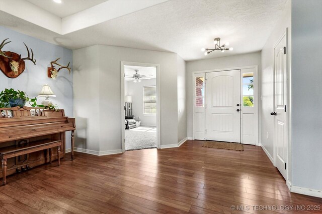 545 E 498th Cir, Pryor, OK 74361 - entrance foyer with hardwood / wood-style flooring and a chandelier