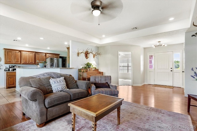545 E 498th Cir, Pryor, OK 74361 - living area featuring light wood-style floors, healthy amount of natural light, recessed lighting, and a ceiling fan