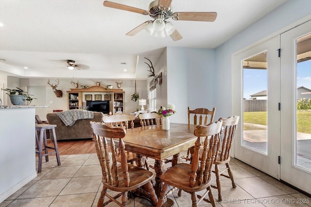 545 E 498th Cir, Pryor, OK 74361 - dining space featuring a ceiling fan, light tile patterned floors, a tray ceiling, and recessed lighting