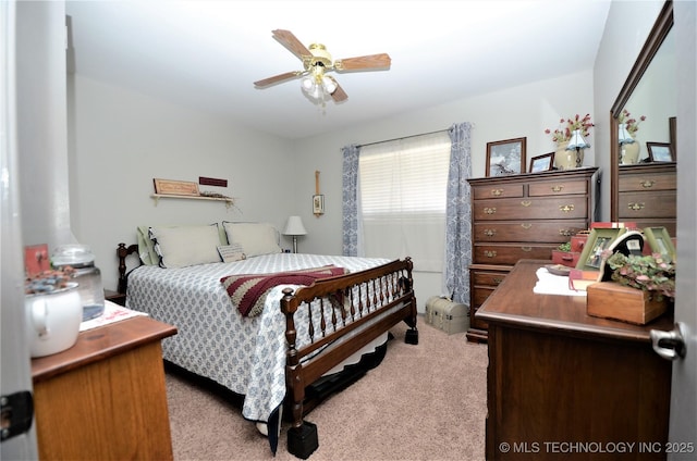236 W 7th Ave, Bristow, OK 74010 - bedroom featuring light colored carpet and ceiling fan