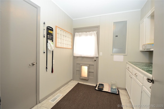 236 W 7th Ave, Bristow, OK 74010 - hallway featuring electric panel and crown molding