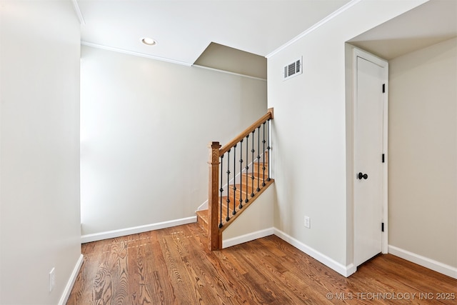 2811 E 22nd St, Tulsa, OK 74114 - stairs featuring wood finished floors, recessed lighting, and crown molding