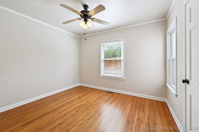 2811 E 22nd St, Tulsa, OK 74114 - spare room with light wood-style floors, ornamental molding, and a ceiling fan