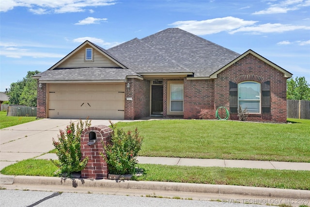 5612 N 31st St, Broken Arrow, OK 74014 - view of front of house featuring brick siding, roof with shingles, an attached garage, and concrete driveway