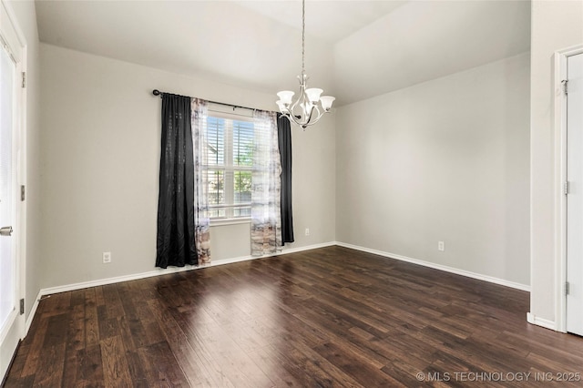 5612 N 31st St, Broken Arrow, OK 74014 - empty room featuring a chandelier, dark wood-type flooring, and vaulted ceiling