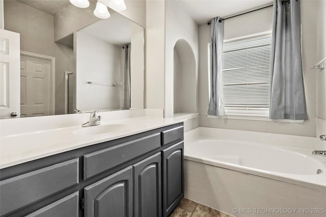 5612 N 31st St, Broken Arrow, OK 74014 - bathroom with a garden tub and vanity