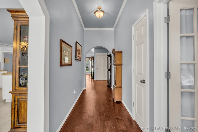 19722 E 50th Ct S, Broken Arrow, OK 74014 - hall with arched walkways, crown molding, and dark wood-type flooring