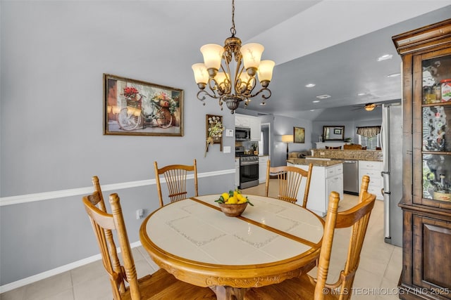 19722 E 50th Ct S, Broken Arrow, OK 74014 - dining area featuring a chandelier, light tile patterned floors, and ceiling fan