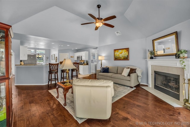 19722 E 50th Ct S, Broken Arrow, OK 74014 - living room with ceiling fan, wood finished floors, a fireplace, and vaulted ceiling