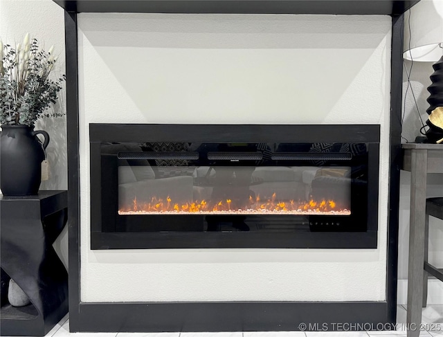 3309 S 116th E Pl, Tulsa, OK 74146 - detailed view of a glass covered fireplace