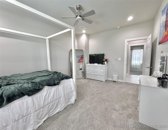 3309 S 116th E Pl, Tulsa, OK 74146 - bedroom with light colored carpet, a ceiling fan, and recessed lighting