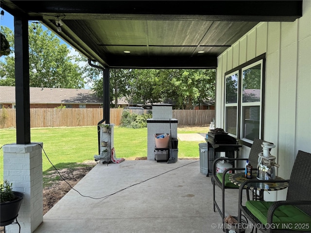3309 S 116th E Pl, Tulsa, OK 74146 - fenced backyard with a patio area