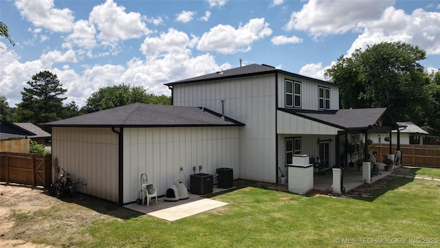 3309 S 116th E Pl, Tulsa, OK 74146 - back of property with a patio area and roof with shingles