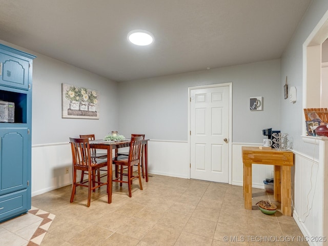 825 W 22nd St, Ada, OK 74820 - dining area featuring light tile patterned flooring
