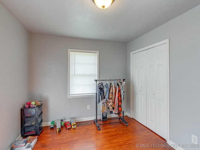 825 W 22nd St, Ada, OK 74820 - workout room featuring wood finished floors