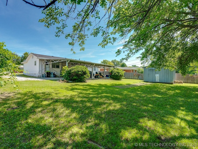 825 W 22nd St, Ada, OK 74820 - fenced backyard featuring a shed, entry steps, and a patio