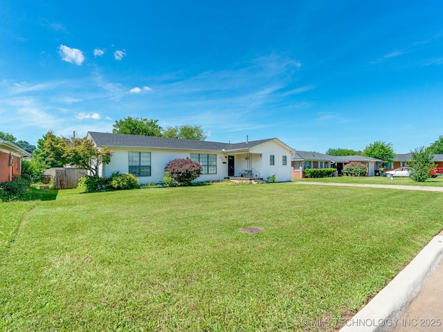 825 W 22nd St, Ada, OK 74820 - ranch-style home featuring driveway