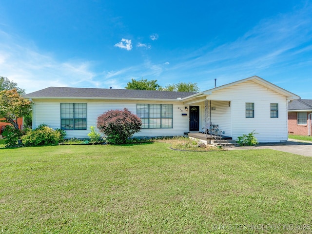 825 W 22nd St, Ada, OK 74820 - ranch-style house featuring a front yard