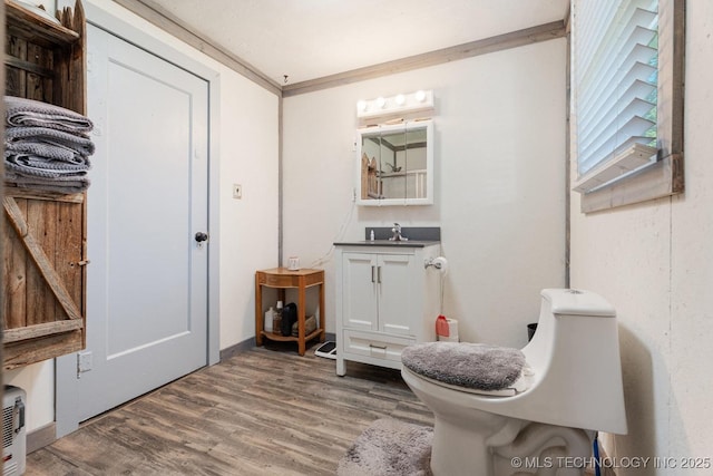 441059 E 155th Rd, Bluejacket, OK 74333 - bathroom featuring vanity and wood finished floors