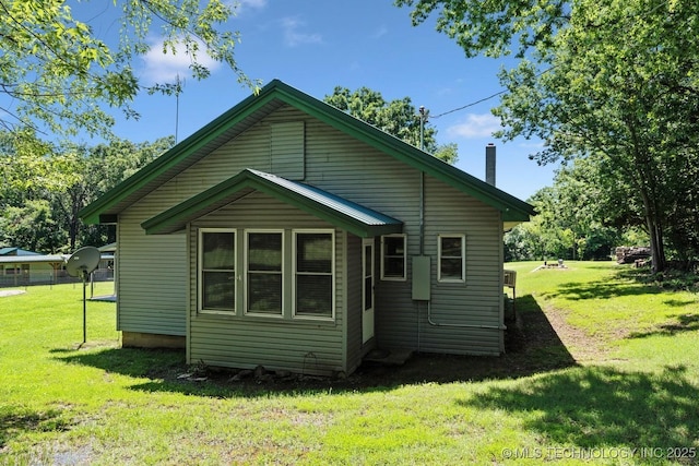 441059 E 155th Rd, Bluejacket, OK 74333 - back of property featuring a yard