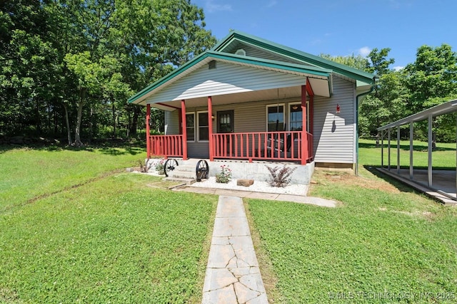 441059 E 155th Rd, Bluejacket, OK 74333 - view of front of property with covered porch and a front lawn