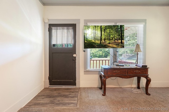 441059 E 155th Rd, Bluejacket, OK 74333 - carpeted foyer featuring baseboards and ornamental molding