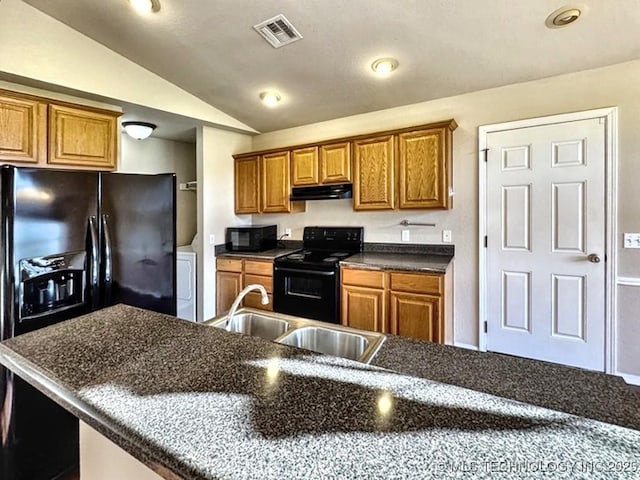 8932 S 258th E Ave, Broken Arrow, OK 74014 - kitchen featuring black appliances, lofted ceiling, brown cabinetry, and dark countertops
