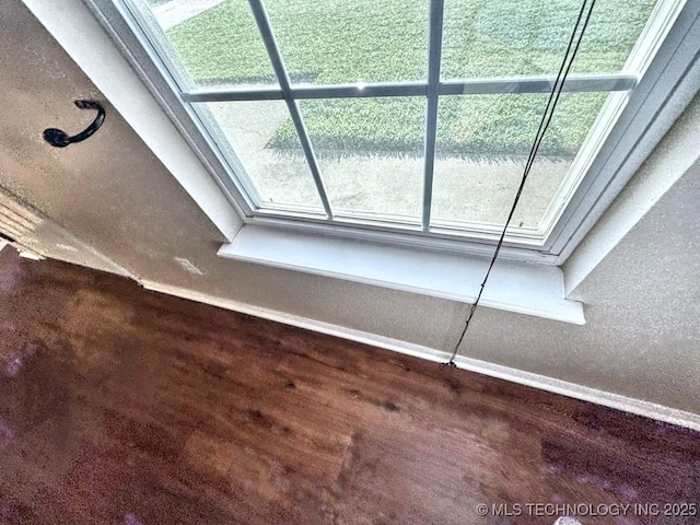 8932 S 258th E Ave, Broken Arrow, OK 74014 - detailed view of wood finished floors and baseboards