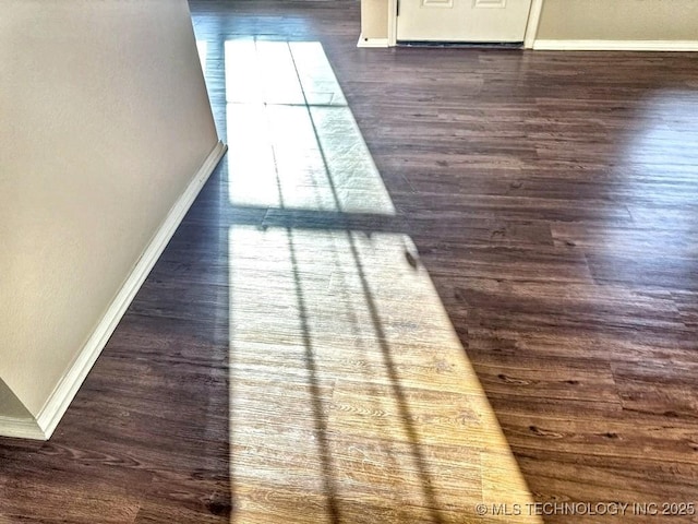 8932 S 258th E Ave, Broken Arrow, OK 74014 - detailed view of baseboards and wood finished floors