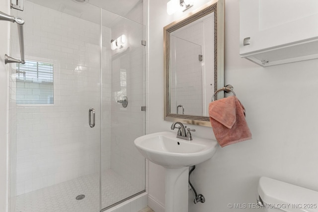3447 S Gary Pl, Tulsa, OK 74105 - bathroom with toilet and a shower stall