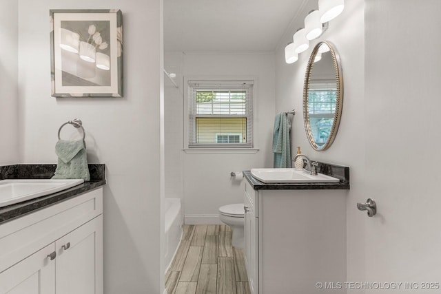 3447 S Gary Pl, Tulsa, OK 74105 - bathroom with vanity, crown molding, shower / tub combination, and wood tiled floors