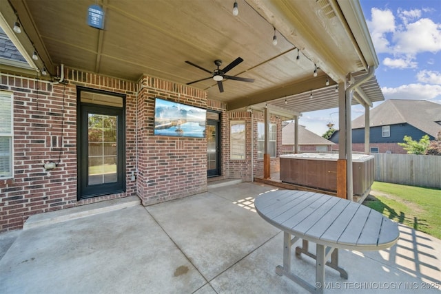 16410 E 49th St, Tulsa, OK 74134 - view of patio / terrace featuring a hot tub and a ceiling fan