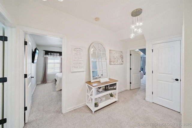 16410 E 49th St, Tulsa, OK 74134 - hallway with carpet floors and vaulted ceiling